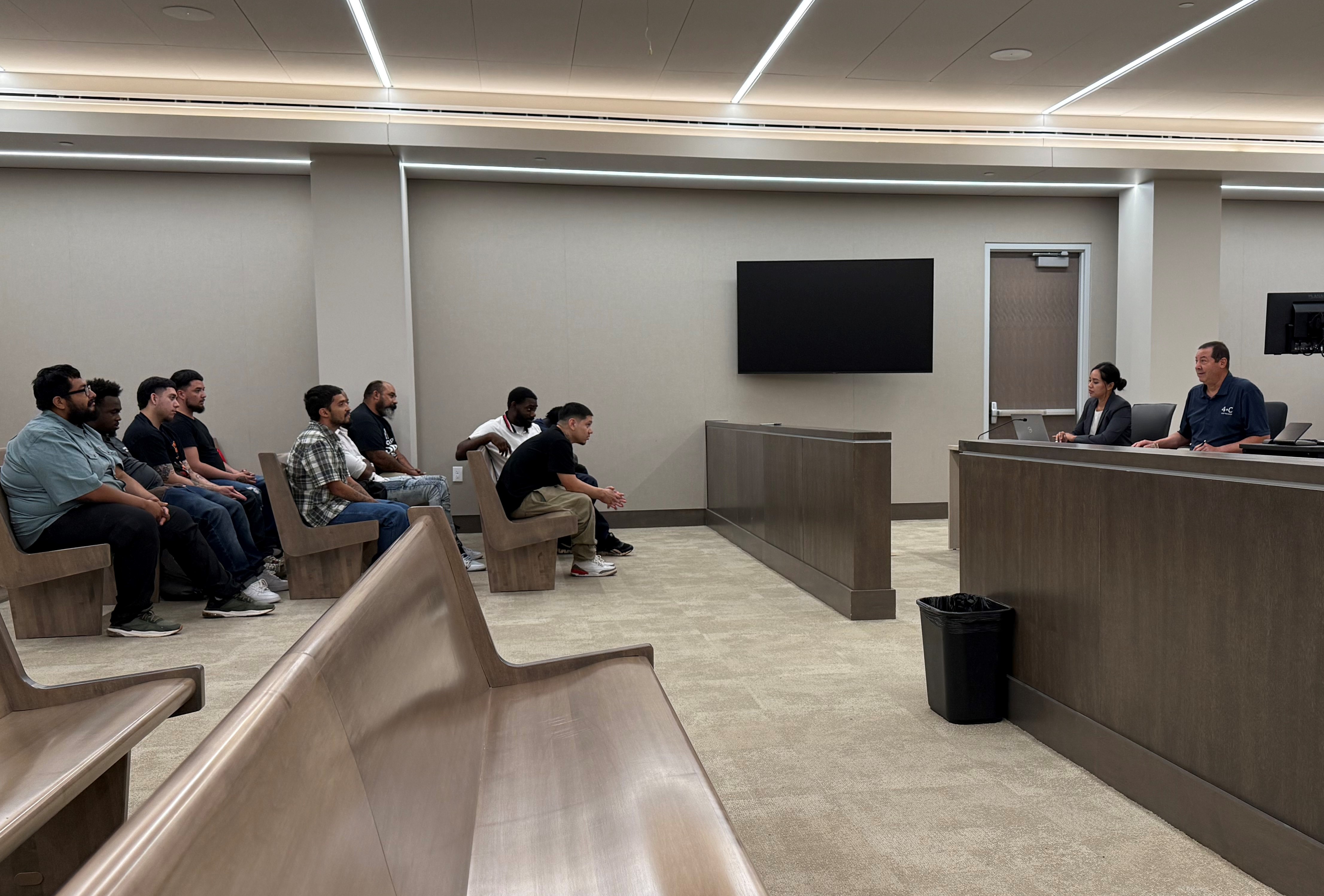 Picture of courtroom with judge and participants